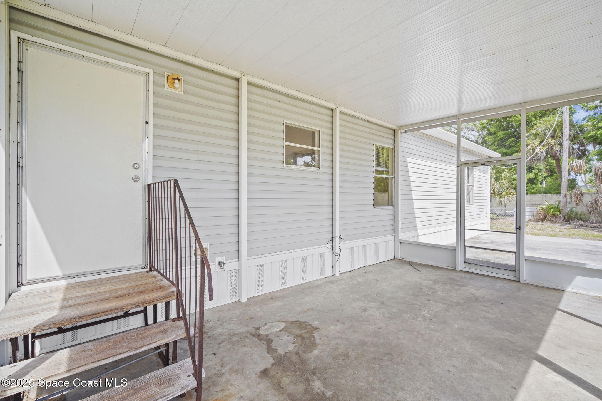 3918 East Ridgewood Drive Cocoa, FL 32926 - Photo 24 of 27 a view of livingroom with furniture and windows
