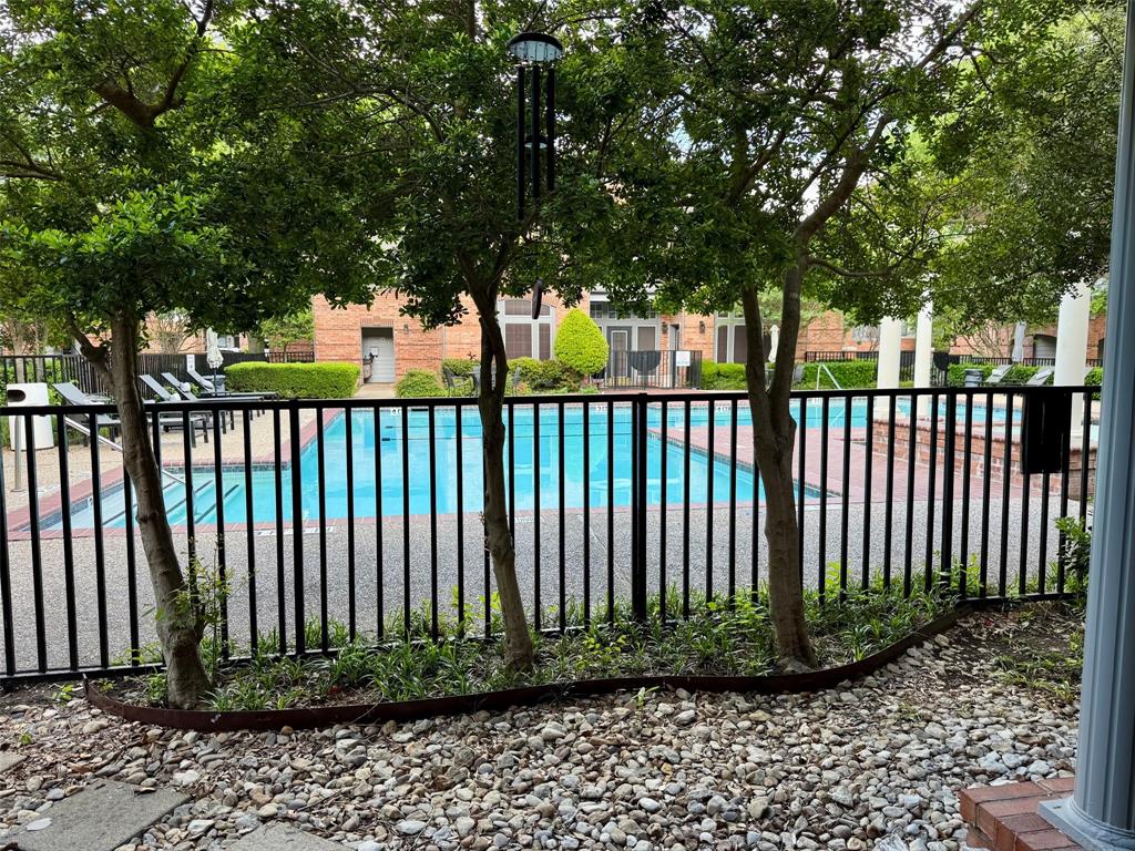 2524 Preston Road, Unit 1205 Plano, TX 75093 - Photo 26 of 31 Daytime view of pool from patio