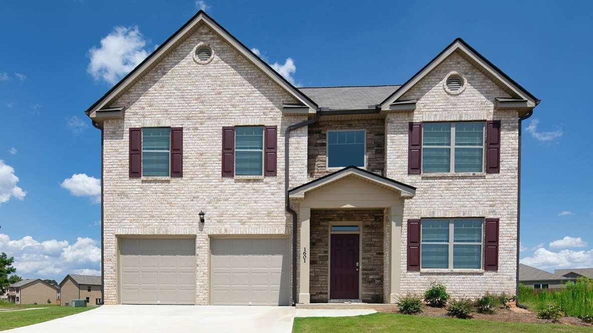 3336 Loblolly Pine Way, Unit 104 Decatur, GA 30034 - Photo 1 of 1 a front view of a house with garden