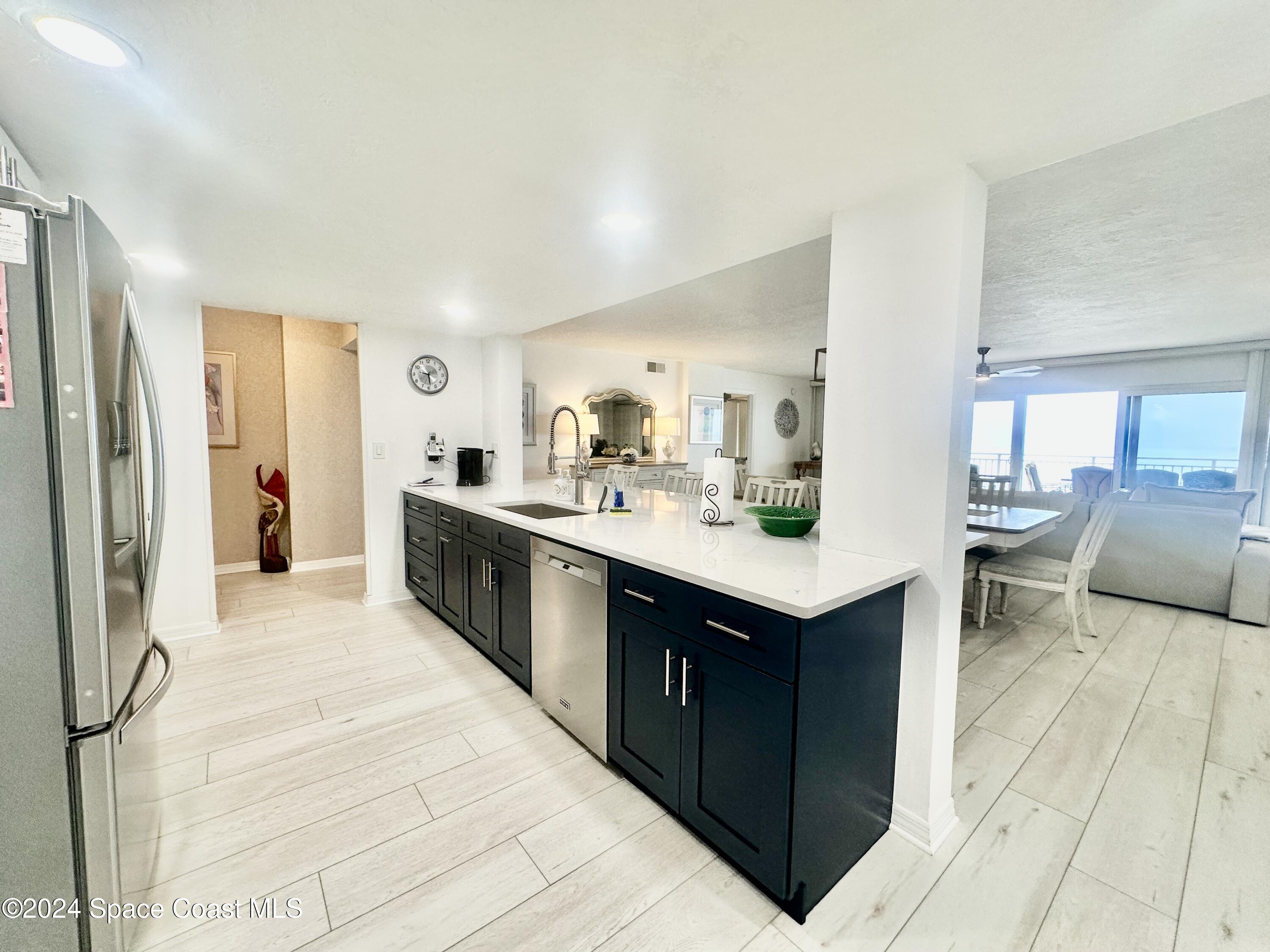 6770 Ridgewood Avenue, Unit 1103 Cocoa Beach, FL 32931 - Photo 6 of 32 IMG_E4046