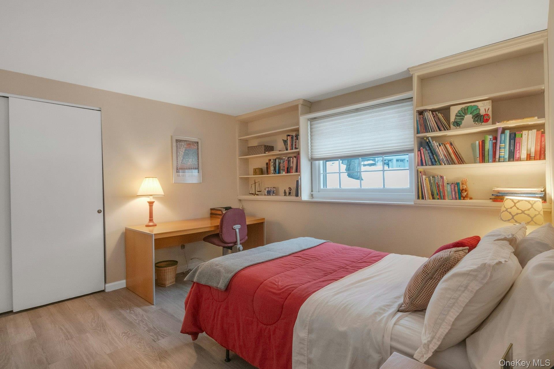 62 Whitson Road Briarcliff Manor, NY 10510 - Photo 28 of 46 Fourth Bedroom is on the Lower Level, with a closet & built-in shelves. New luxury vinyl flooring.