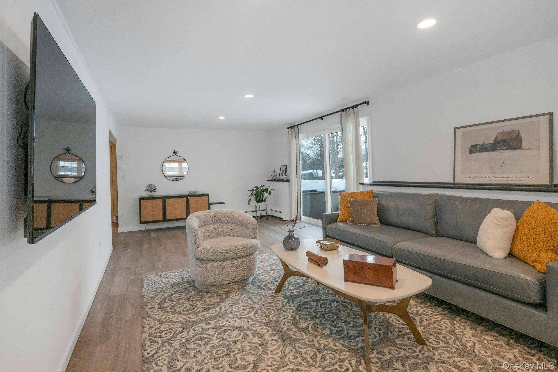 62 Whitson Road Briarcliff Manor, NY 10510 - Photo 30 of 46 You'll spend lots of time in this fabulous Family Room with new luxury vinyl flooring, wall-mounted television and recessed lights.