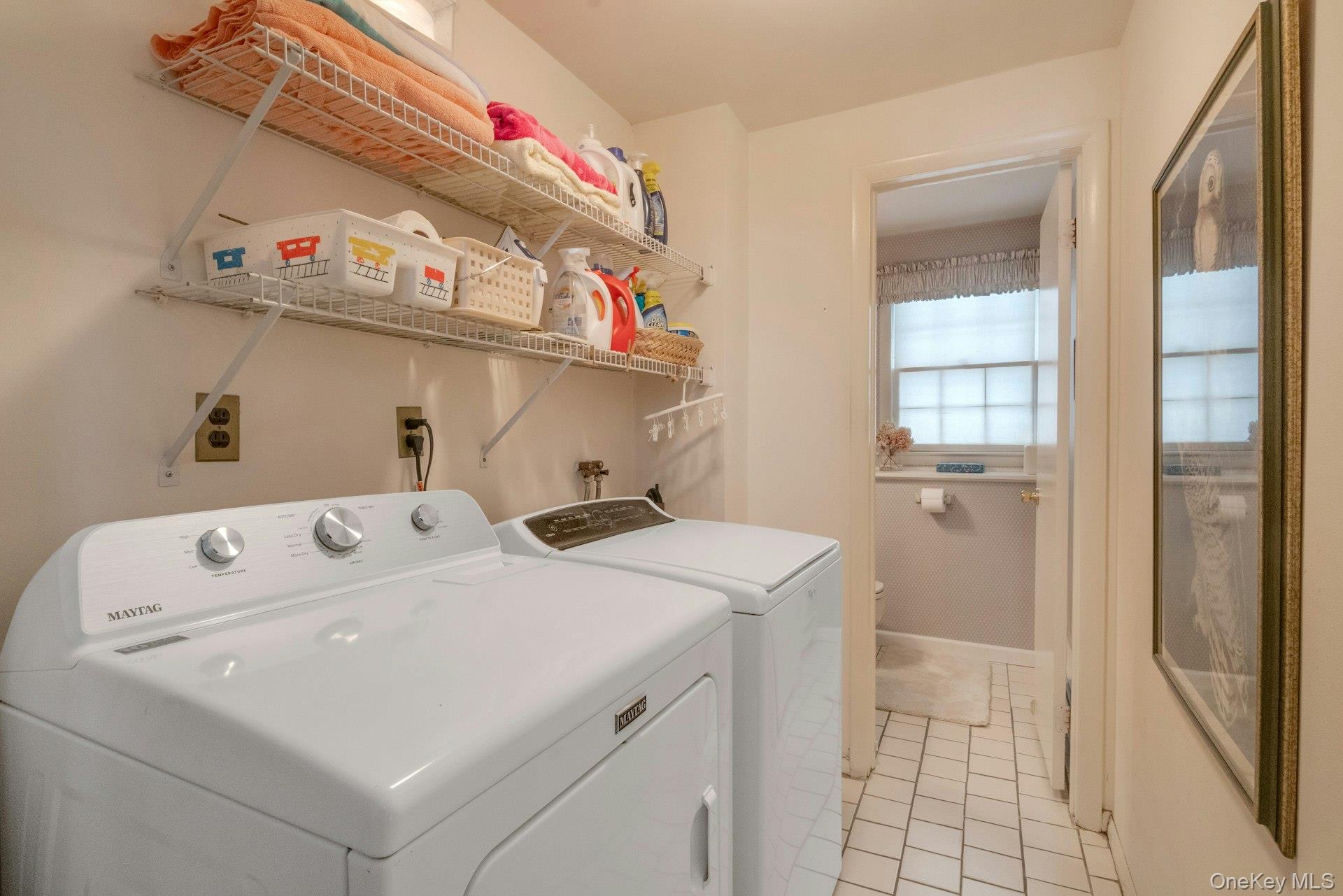 62 Whitson Road Briarcliff Manor, NY 10510 - Photo 33 of 46 The dedicated Laundry room is conveniently located just inside the lower level from the garages. Washer/Dryer & shelving included.