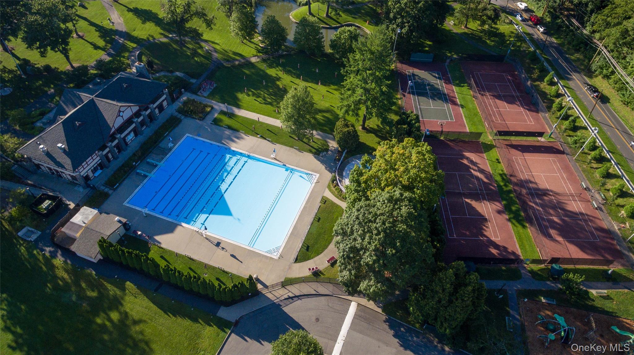 62 Whitson Road Briarcliff Manor, NY 10510 - Photo 42 of 46 Briarcliff Manor community pool and pavilion as well as tennis courts.