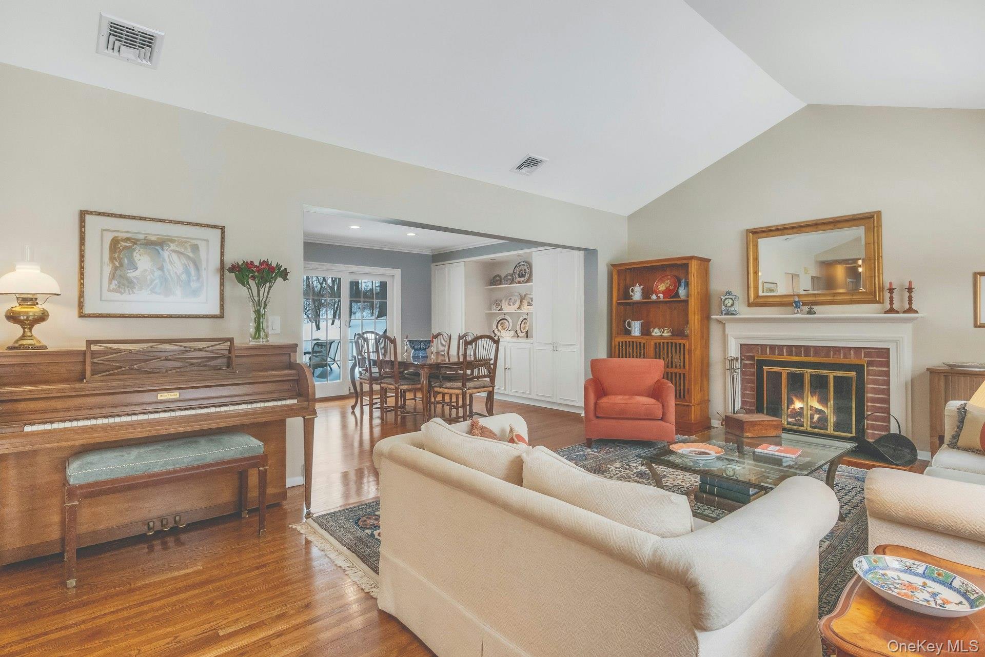 62 Whitson Road Briarcliff Manor, NY 10510 - Photo 5 of 46 Another view of the Living Room towards the cozy Fireplace & open flow to the Dining Room on the left.
