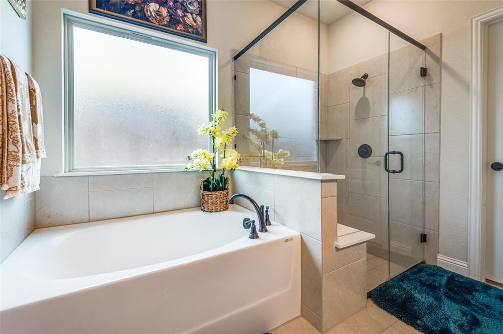 3822 Myrtle Way Kaufman, TX 75142 - Photo 22 of 39 a white bath tub sitting next to a small bathroom