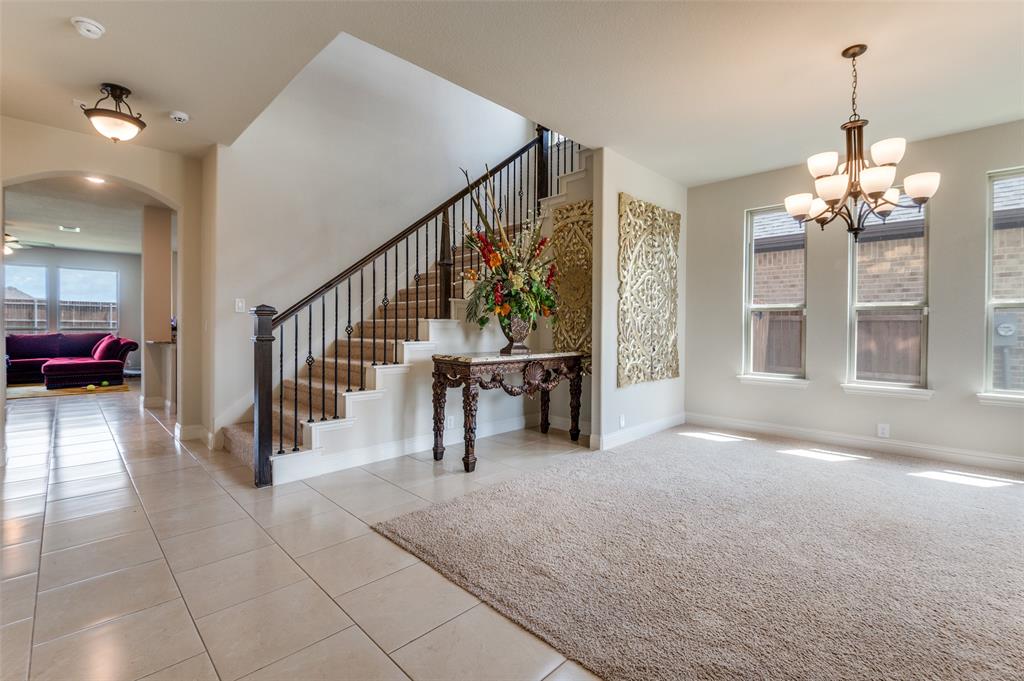 3822 Myrtle Way Kaufman, TX 75142 - Photo 7 of 39 a view of a livingroom with furniture and stairs