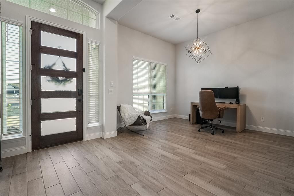 1843 Granite Way Van Alstyne, TX 75495 - Photo 12 of 39 a view of a workspace with furniture and a window