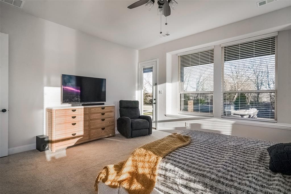 1843 Granite Way Van Alstyne, TX 75495 - Photo 25 of 39 a bedroom with furniture and flat screen tv