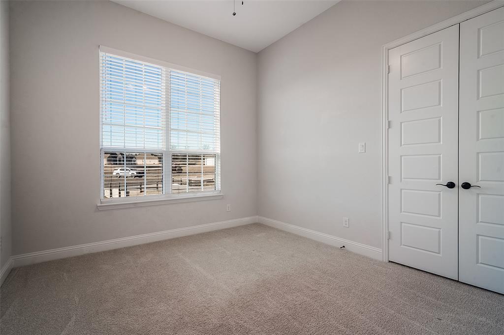 1843 Granite Way Van Alstyne, TX 75495 - Photo 31 of 39 a view of an empty room with a window