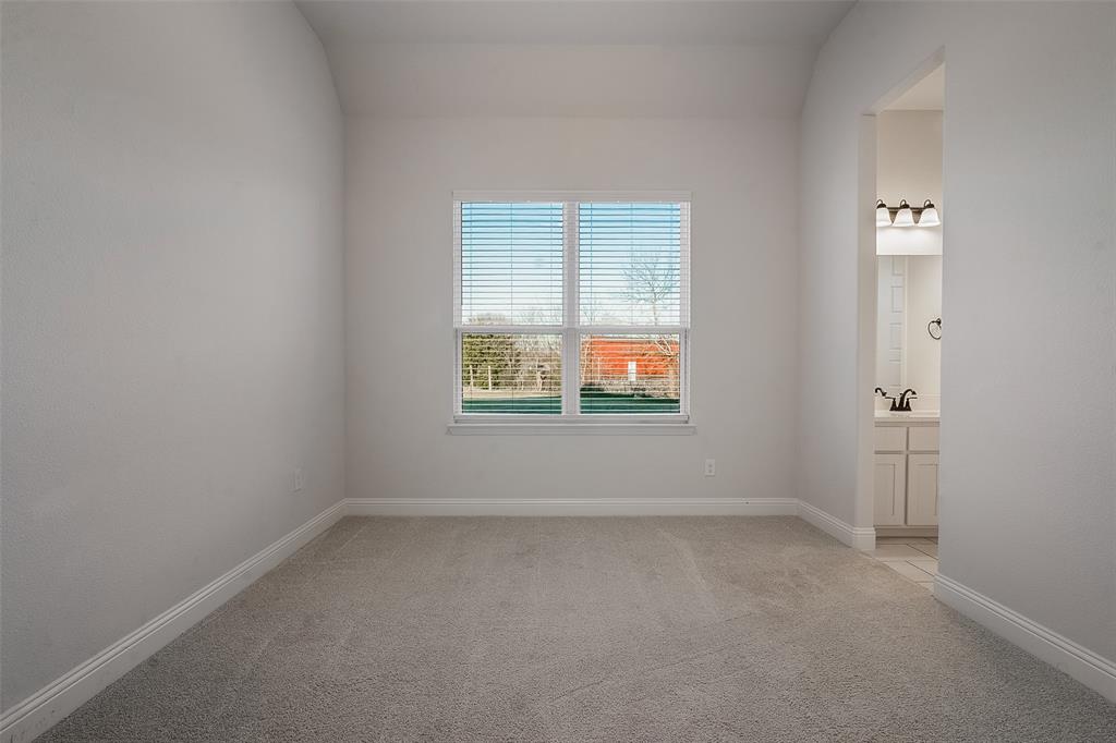 1843 Granite Way Van Alstyne, TX 75495 - Photo 34 of 39 an empty room with windows