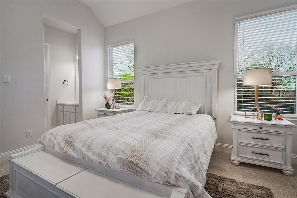 1843 Granite Way Van Alstyne, TX 75495 - Photo 37 of 39 a bedroom with a bed and a window