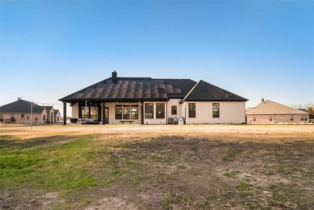 1843 Granite Way Van Alstyne, TX 75495 - Photo 5 of 39 a front view of a house with yard