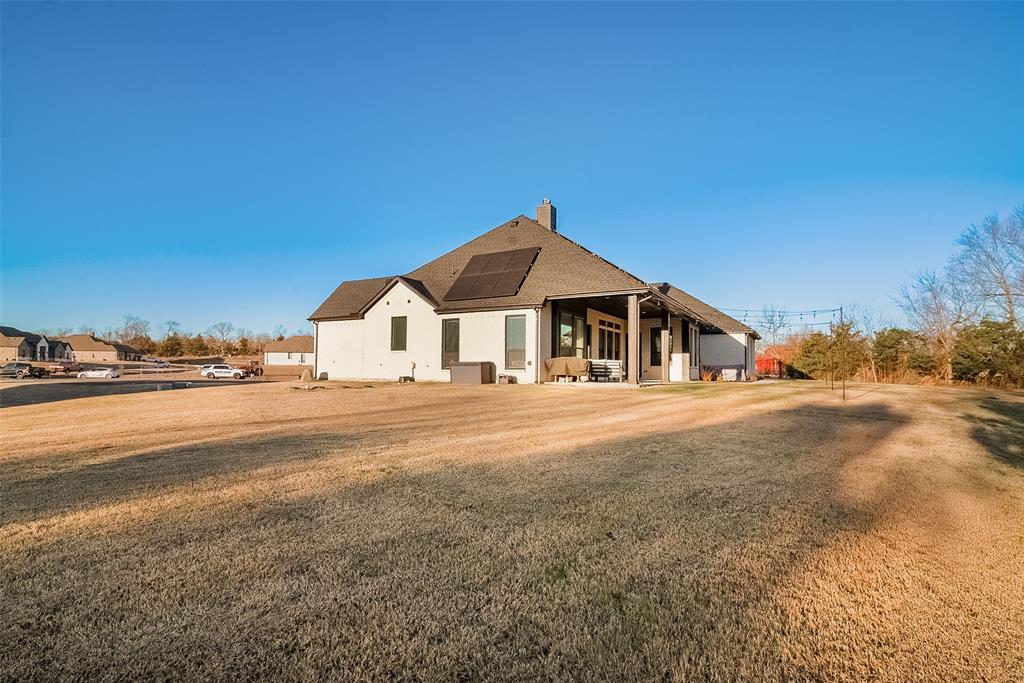 1843 Granite Way Van Alstyne, TX 75495 - Photo 6 of 39 a view of a house with a yard