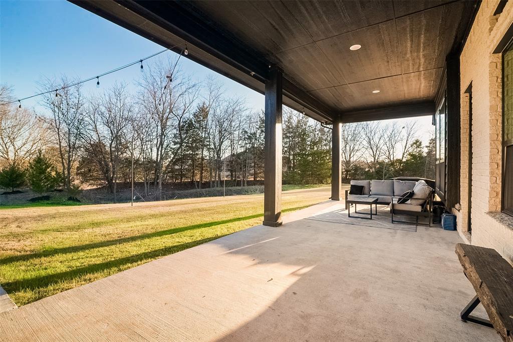 1843 Granite Way Van Alstyne, TX 75495 - Photo 8 of 39 a view of a living room and floor to ceiling window and yard