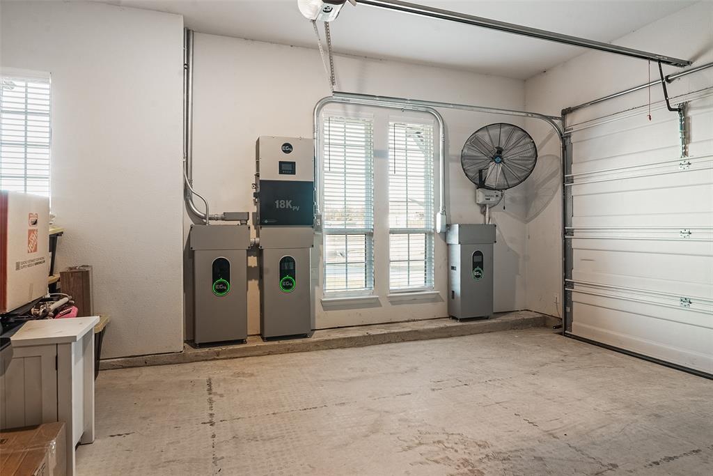 1843 Granite Way Van Alstyne, TX 75495 - Photo 9 of 39 a view of a room with gym equipment and a window