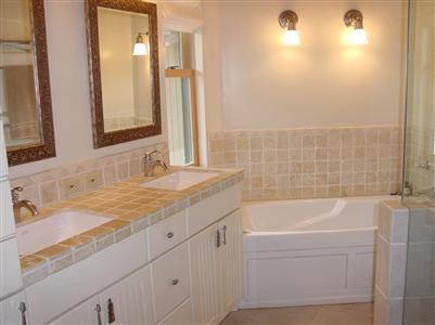 100 Oak Ridge Road San Rafael, CA 94903 - Photo 4 of 6 a bathroom with a granite countertop sink and a bathtub
