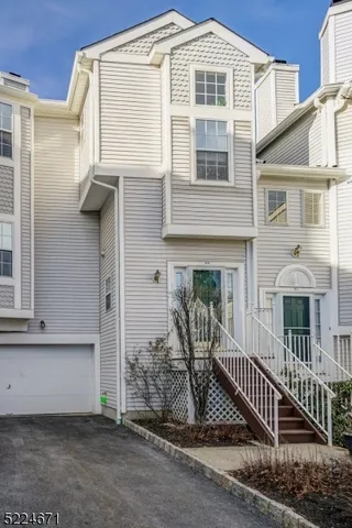 a front view of a house with a porch