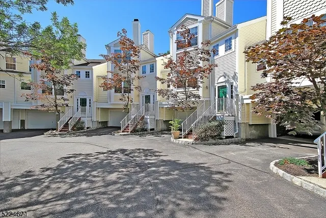 a view of a street with cars