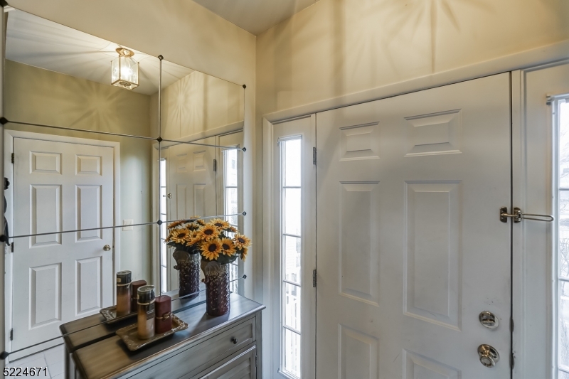 404 Brookview Court Whippany, NJ 07981 - Photo 16 of 29 a bathroom with a mirror and a shower