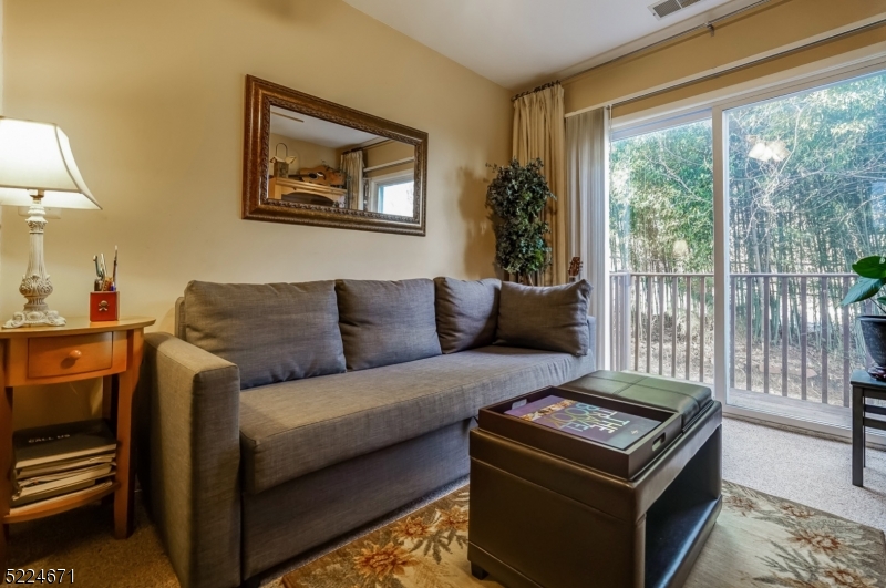 404 Brookview Court Whippany, NJ 07981 - Photo 7 of 29 a living room with furniture and a gate
