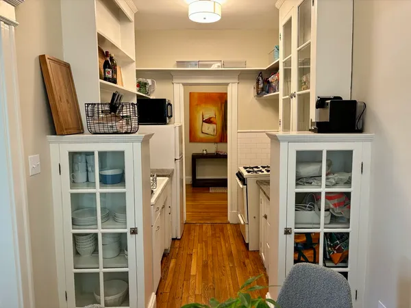 a view of living room with furniture and windows