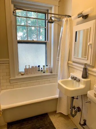 a bathroom with a sink and a bathtub