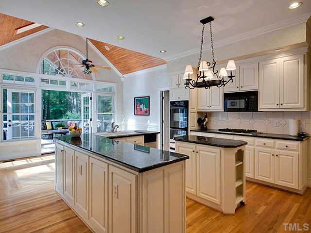 445 Swans Mill Crossing Raleigh, NC 27614 - Photo 5 of 17 Hardwood Flooring in kitchen had just been refinished the day this photo was taken.