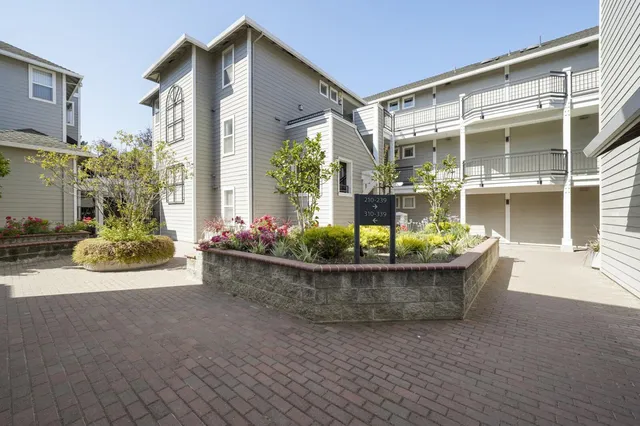 front view of a house with a small yard