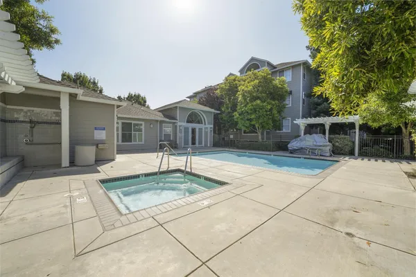 a view of a house with a swimming pool