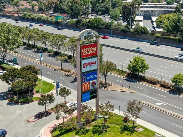 a front view of a house with parking space