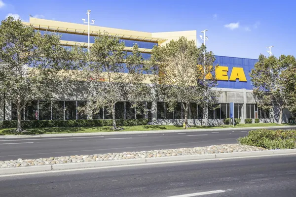 a front view of a building with street sign