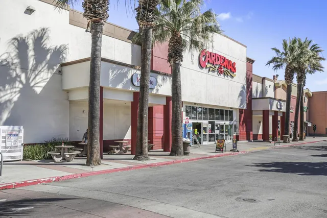 a view of a street with a building on the street