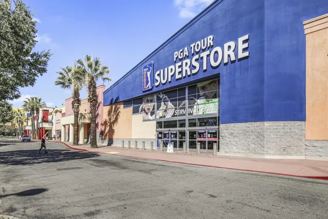 a building exterior with stairs and bench