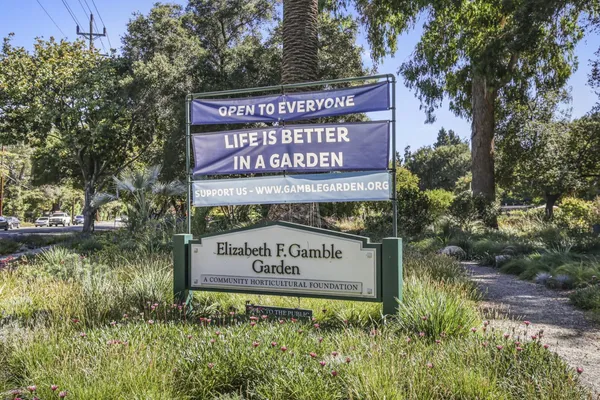 a sign on the side of the road
