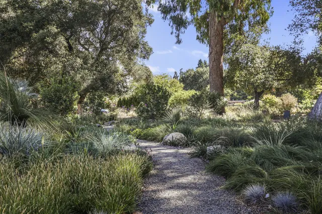 a view of a building with sitting area