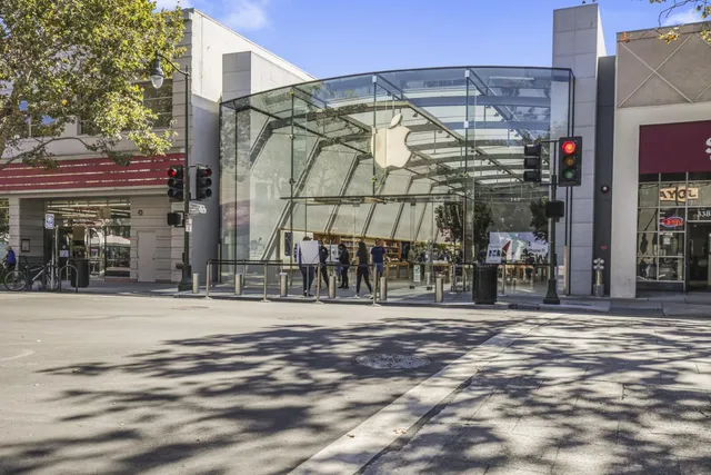 a view of a cafe with sitting area