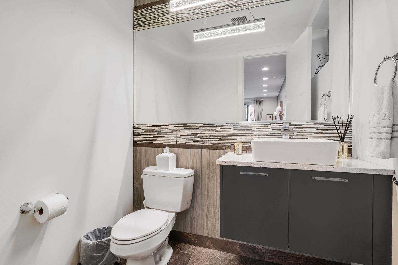 933 West George Street, Unit 1N Chicago, IL 60657 - Photo 15 of 30 a bathroom with a sink a toilet and mirror
