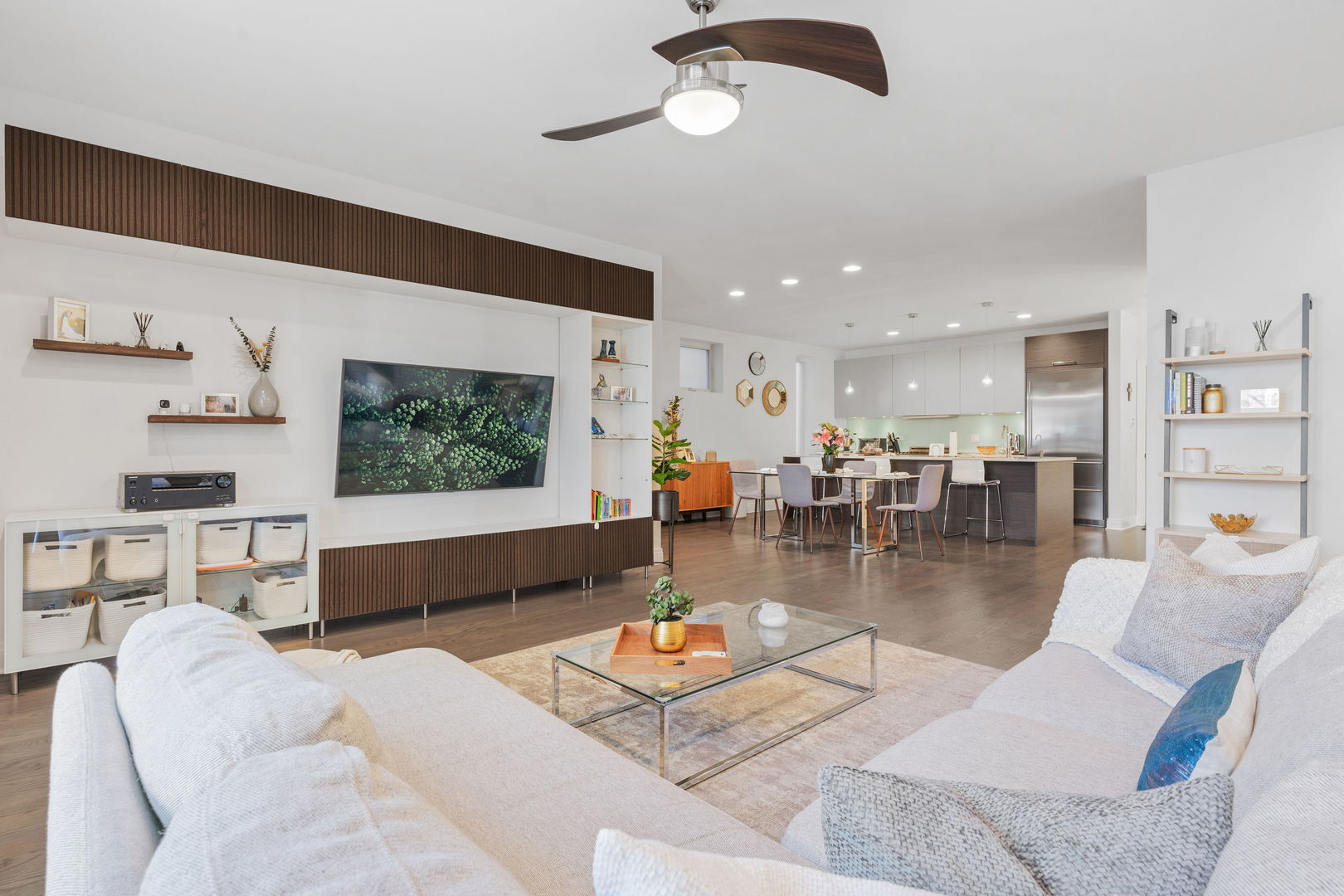 933 West George Street, Unit 1N Chicago, IL 60657 - Photo 2 of 30 a living room with furniture and a flat screen tv