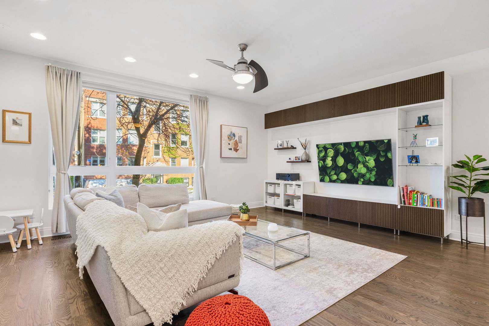 933 West George Street, Unit 1N Chicago, IL 60657 - Photo 4 of 30 a living room with furniture and a large window
