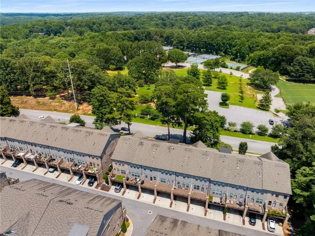 an aerial view of a house having yard