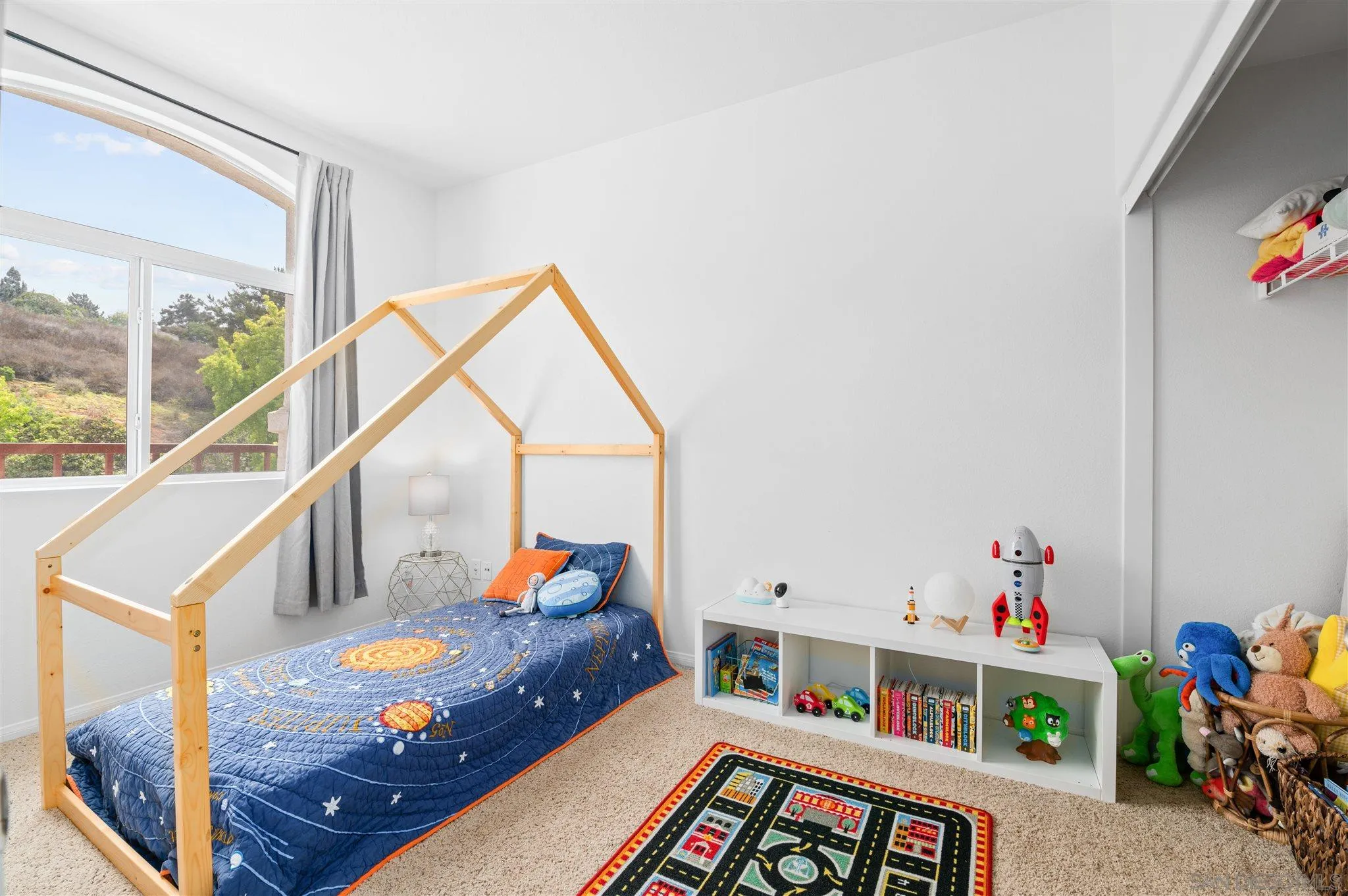 798 Windridge Circle San Marcos, CA 92078 - Photo 18 of 31 a bedroom with furniture and a window