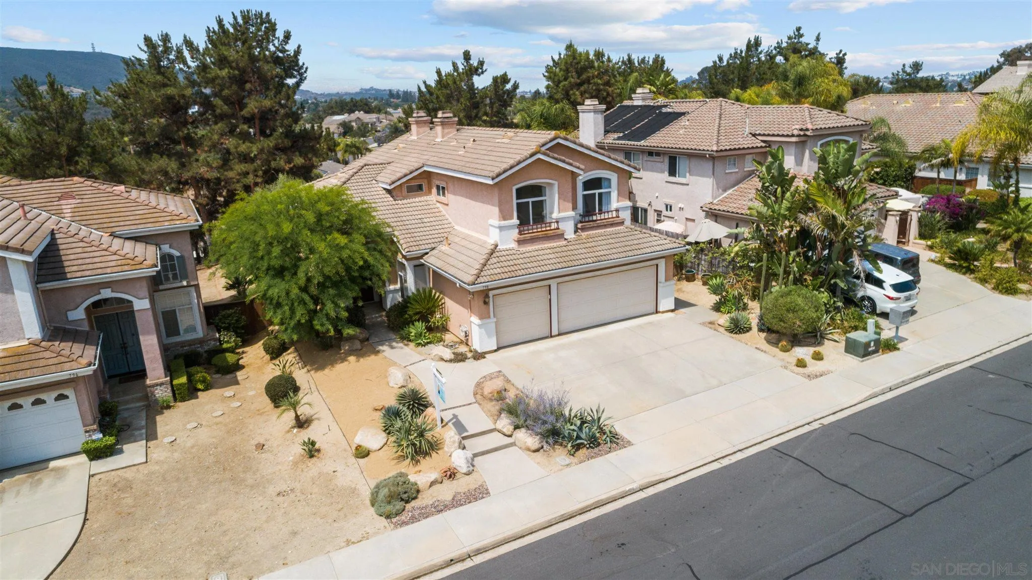 798 Windridge Circle San Marcos, CA 92078 - Photo 2 of 31 an aerial view of a house with a yard
