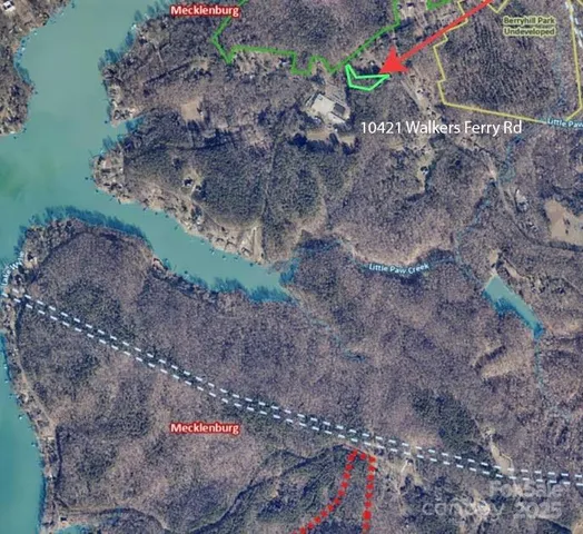 a picture of water view with large trees