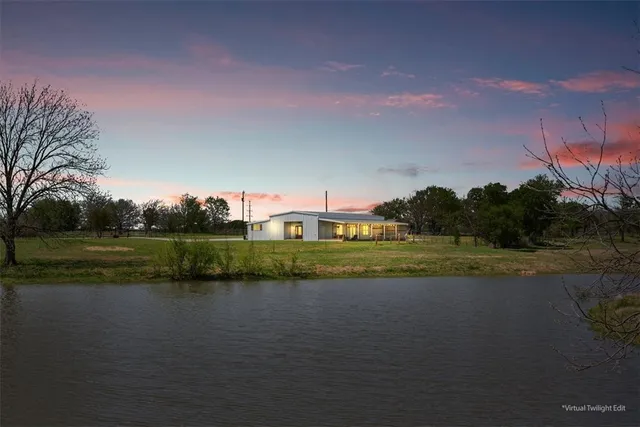 a view of a lake and green space