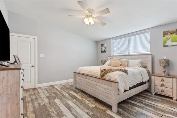 a bathroom with double vanity sinks and a mirror