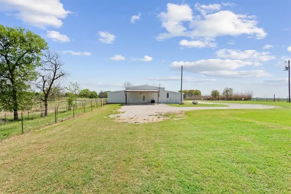 a view of a lake from a yard