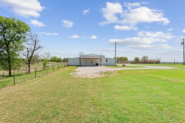 a view of a lake from a yard