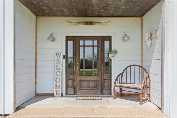 a view of entryway with a front door