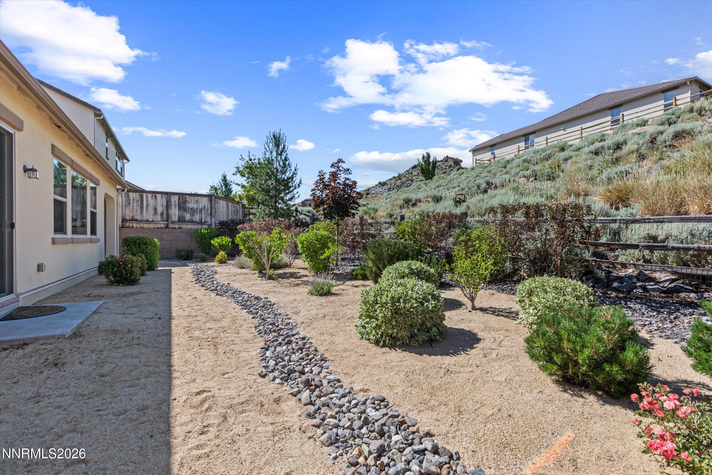 1725 Verdi Vista Court Reno, NV 89523 - Photo 28 of 37 a view of a garden with a pathway